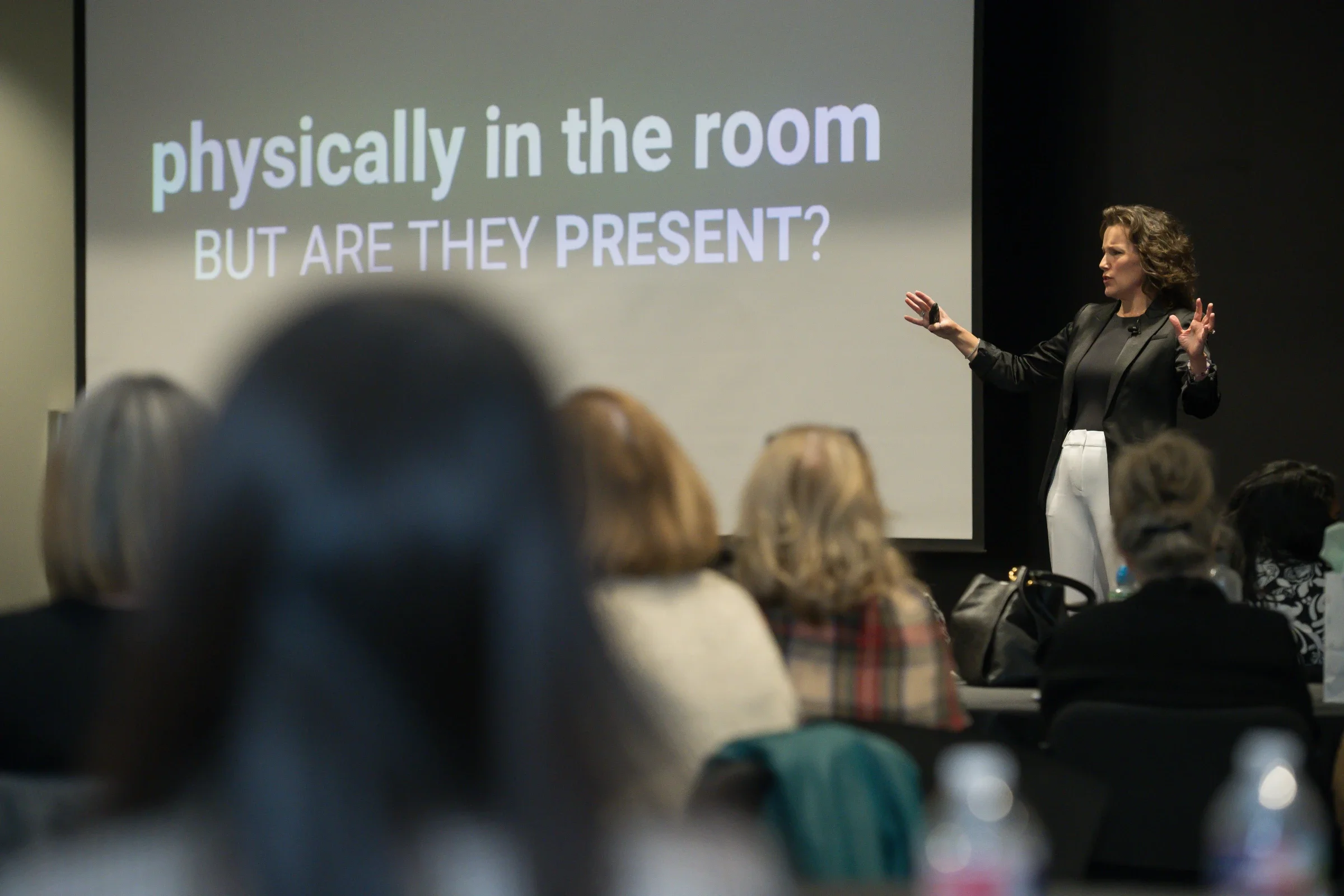 Renee Funk speaking on stage