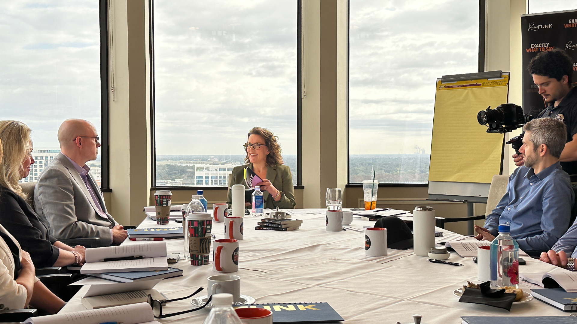 Renee Funk leading a boardroom workshop with executives