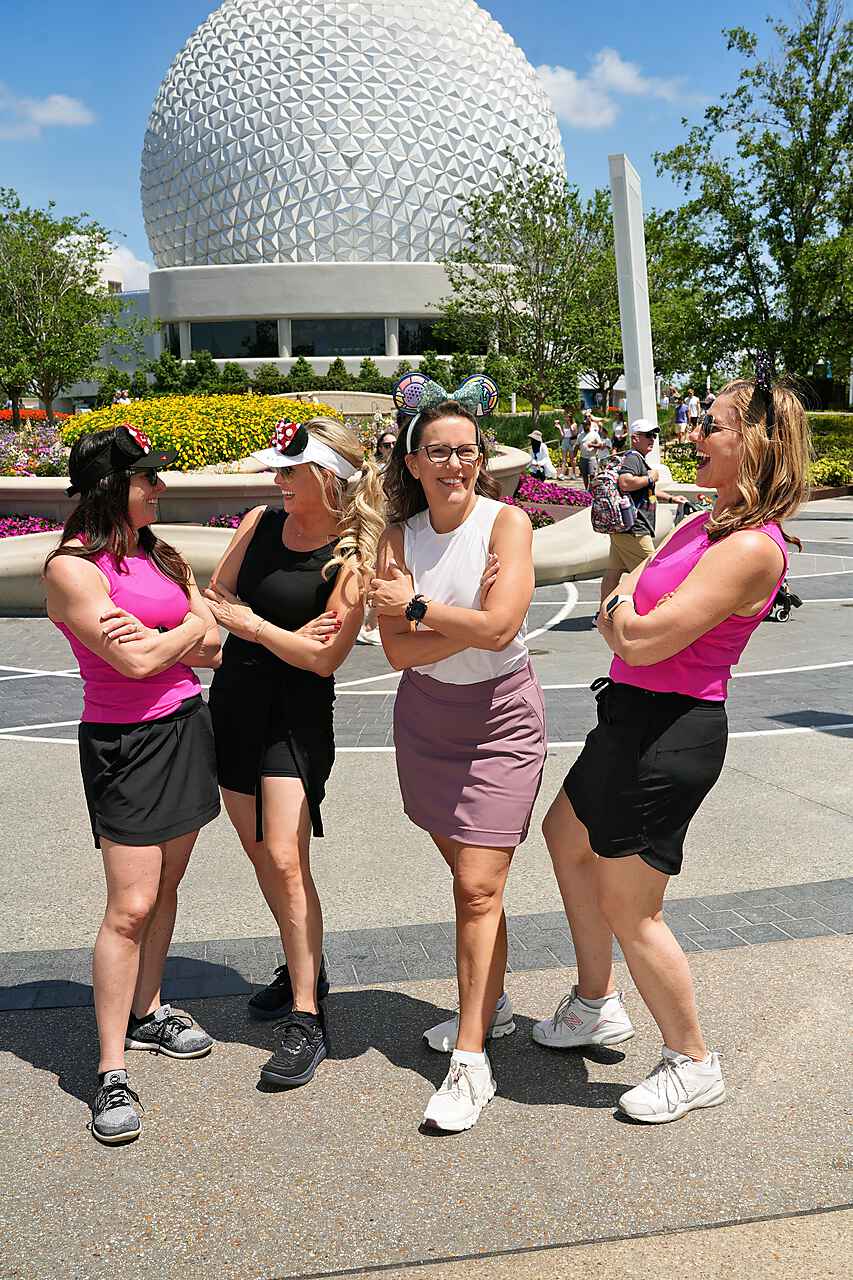 Renee Funk with friends in front of Epcot's Spaceship Earth at Walt Disney World