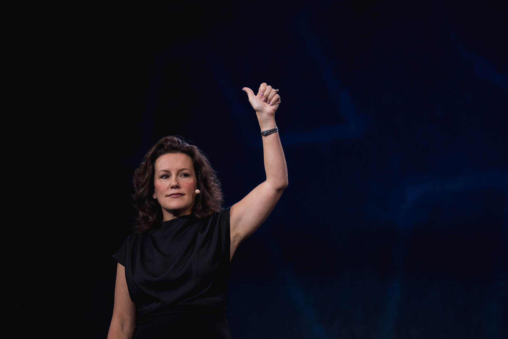 Renee Funk speaking on stage