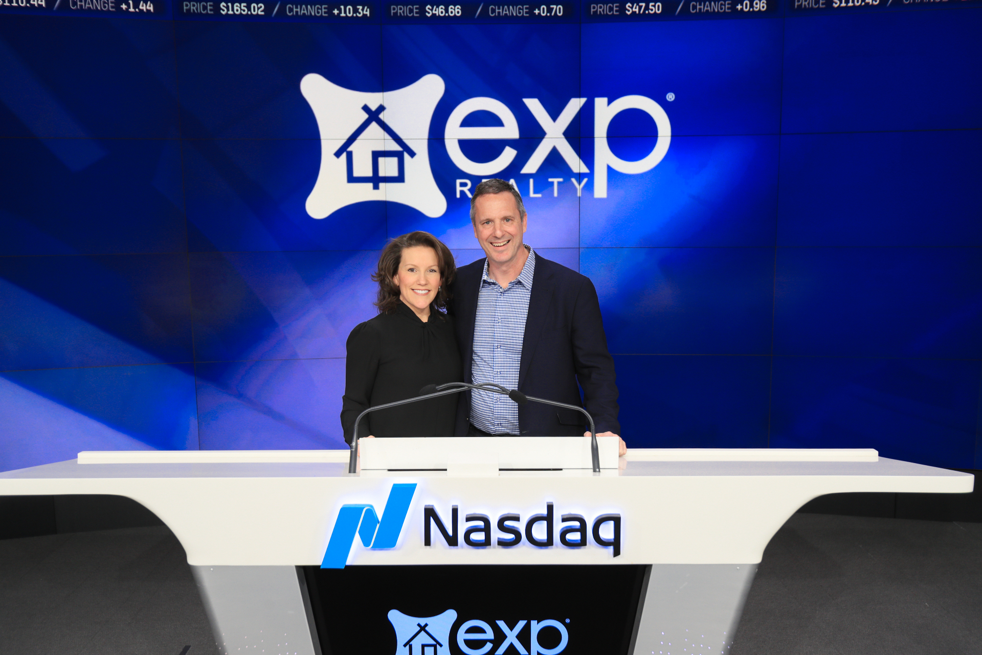Renee Funk on the NASDAQ podium in Times Square the day she rang the closing bell